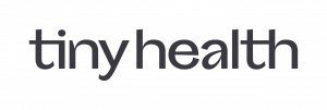 The image displays the logo tiny health in lowercase, bold, dark gray letters on a light gray background.