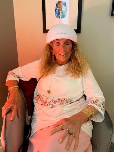 Dr Susan Marra wearing the Neuroradiant 1070 Red Light Therapy Helmet